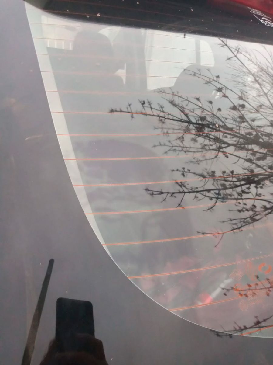 La primera foto que publicó Belén Sbarbatti de la imagen de Cristo en su auto. (Foto: Facebook/Belén Sbarbatti). 